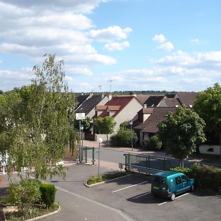Kyriad Direct Acheres Exterior foto