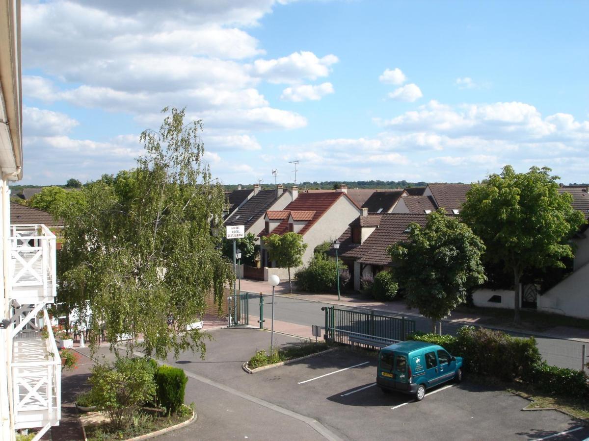 Kyriad Direct Acheres Exterior foto